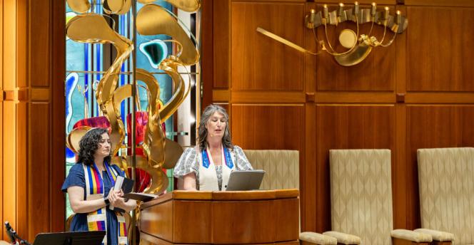 Cantor leading services in a sanctuary