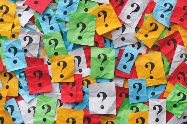 A graphic full of colorful question marks