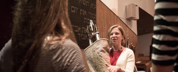 Cantor presents b'nai mitzvah students the torah